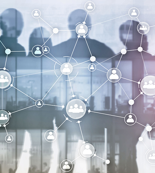 A network of interconnected people icons overlaid on silhouettes of business professionals, suggesting human resources or organizational structure.
